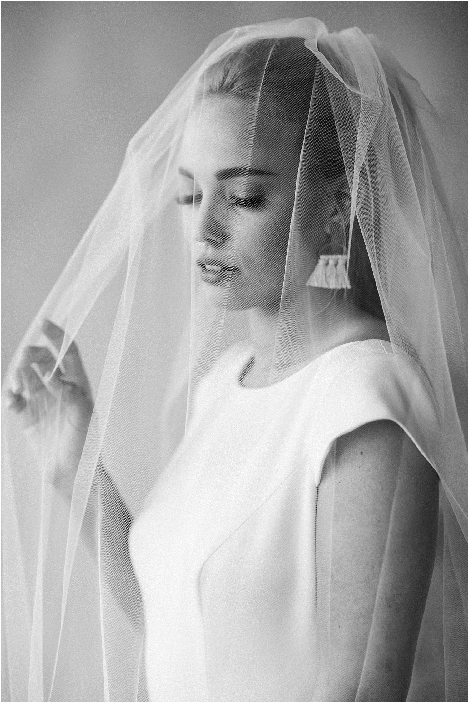 black and white film image modern bride veil portrait